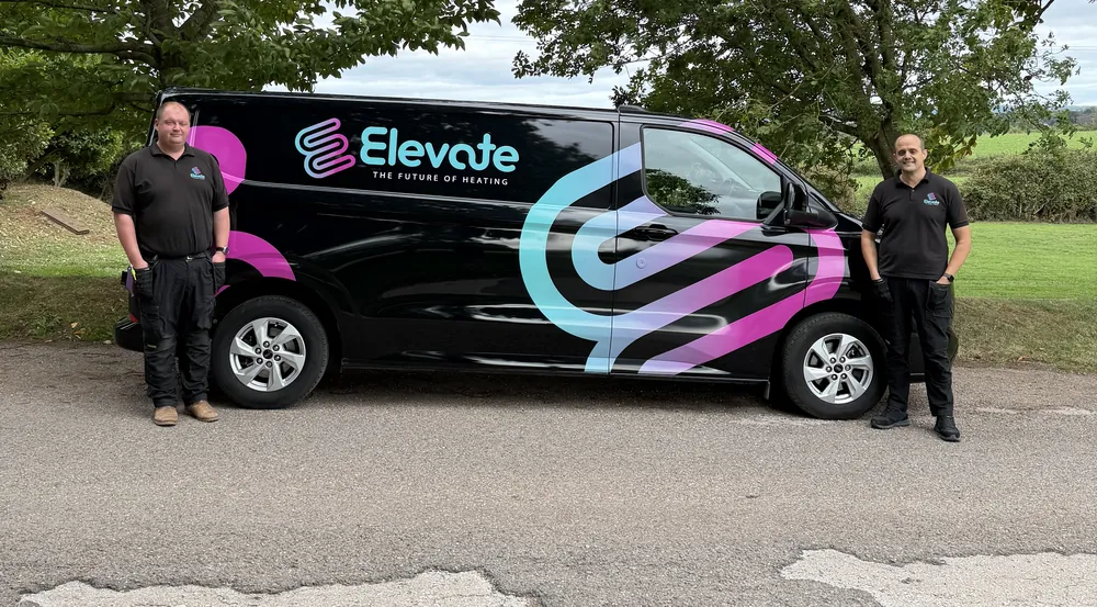 Declan Taylor, left, and Rob Shute, right, standing either side of the Elevate South West van