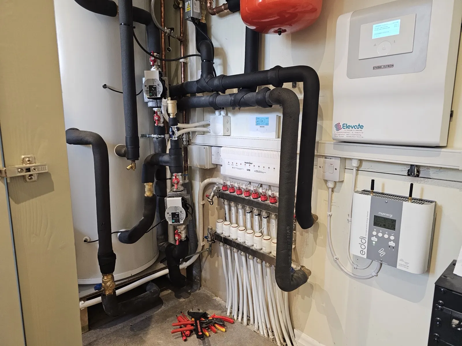 Underfloor heating manifold, wiring centre and controls in an Elevate plant room